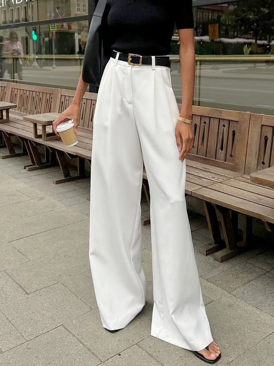 Pantalones blancos de tiro alto y pernera ancha