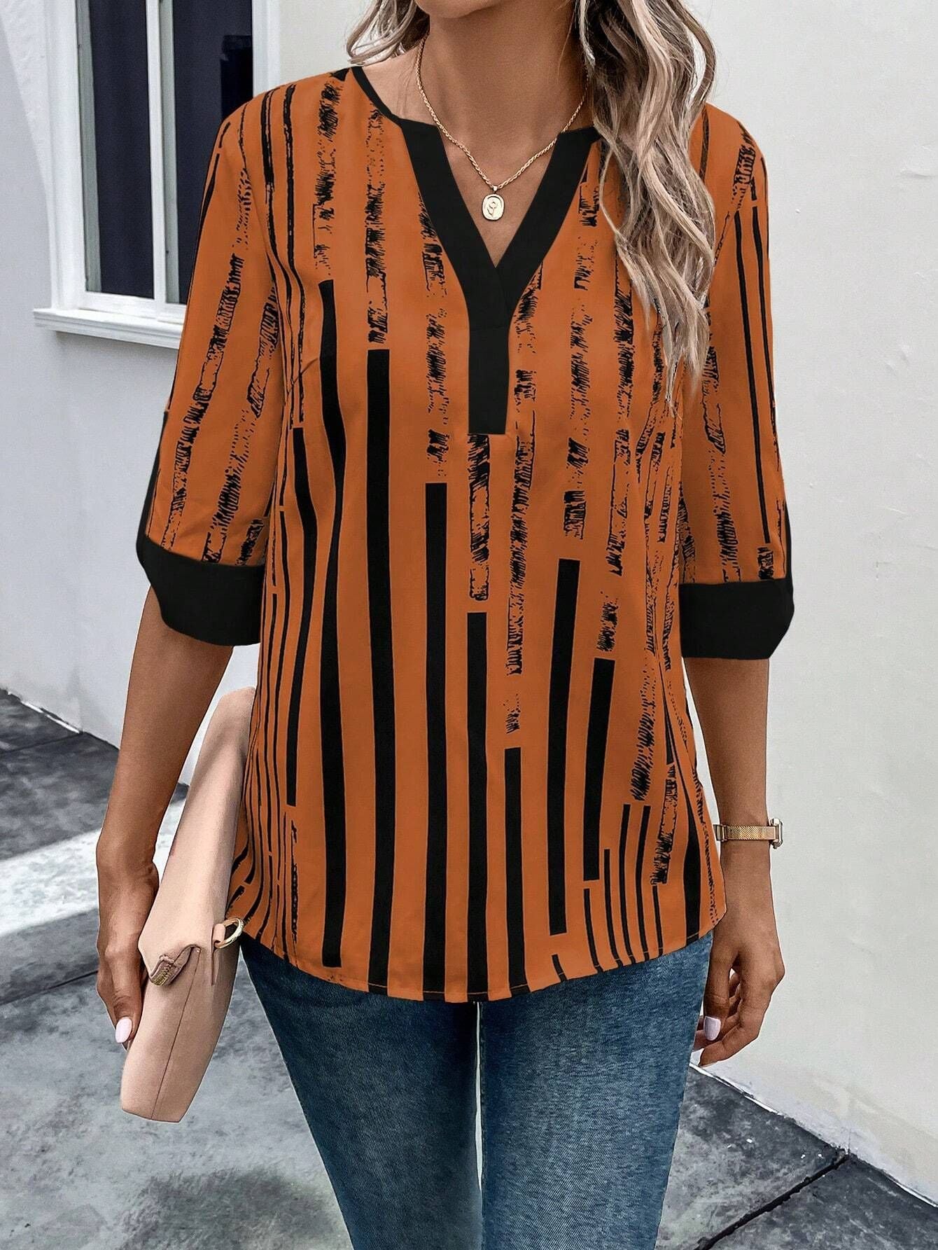 Inés - Camicetta a righe con scollo a V