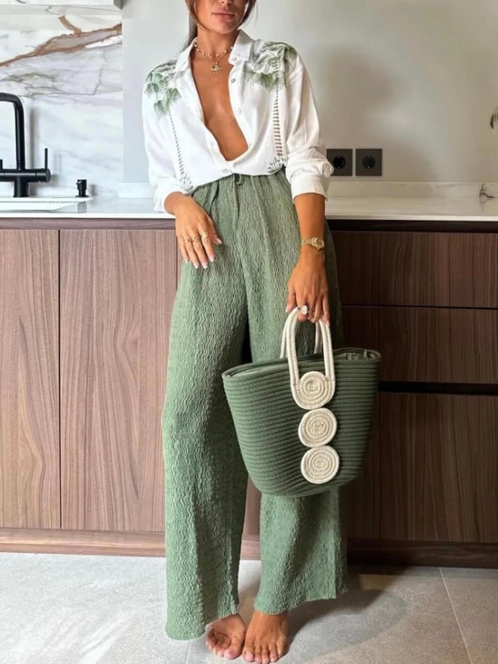Pantaloni elasticizzati a pieghe Tropical